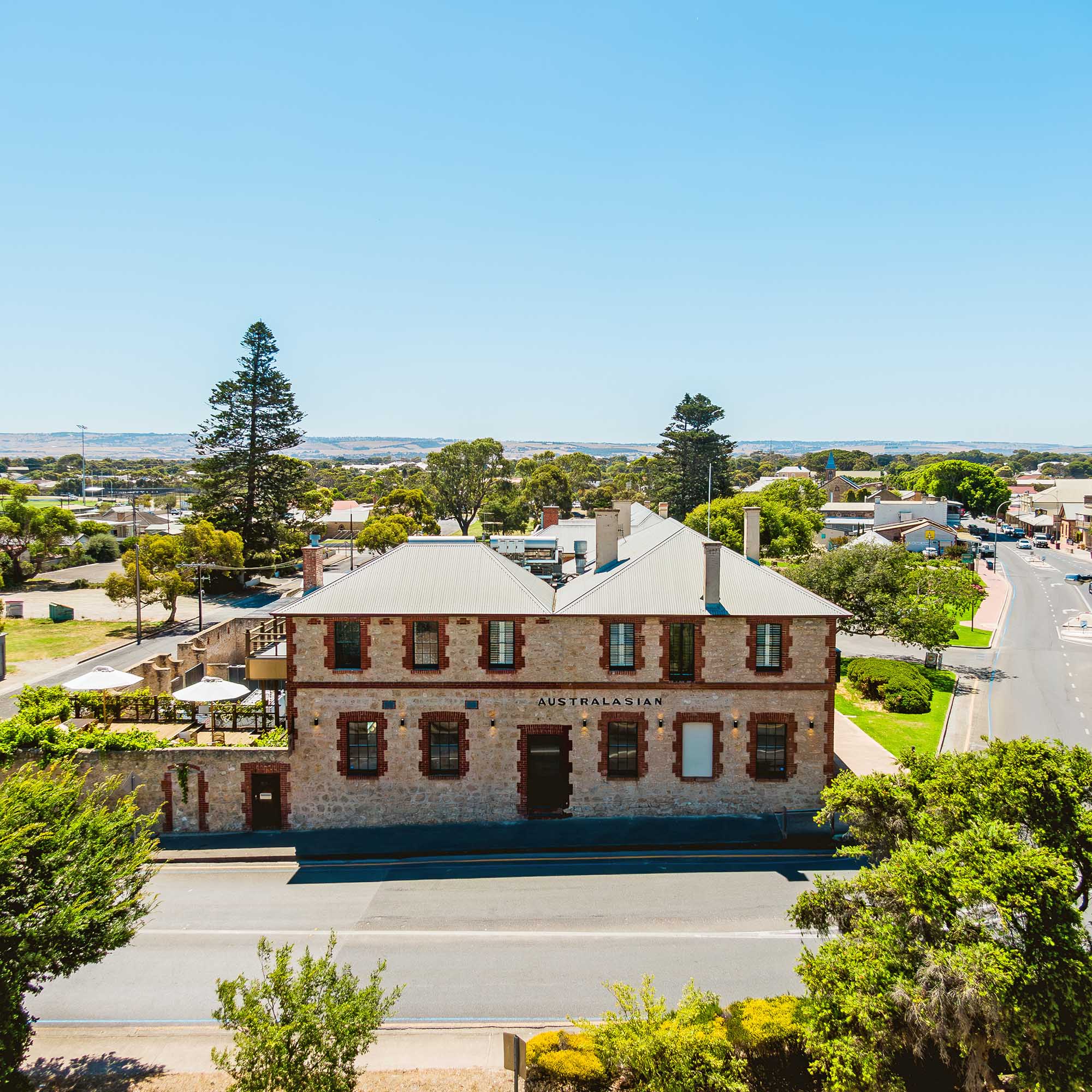 Exterior view of The Australasian Boutique Accommodation venue in Goolwa, South Australia — a heritage building offering luxury stays.